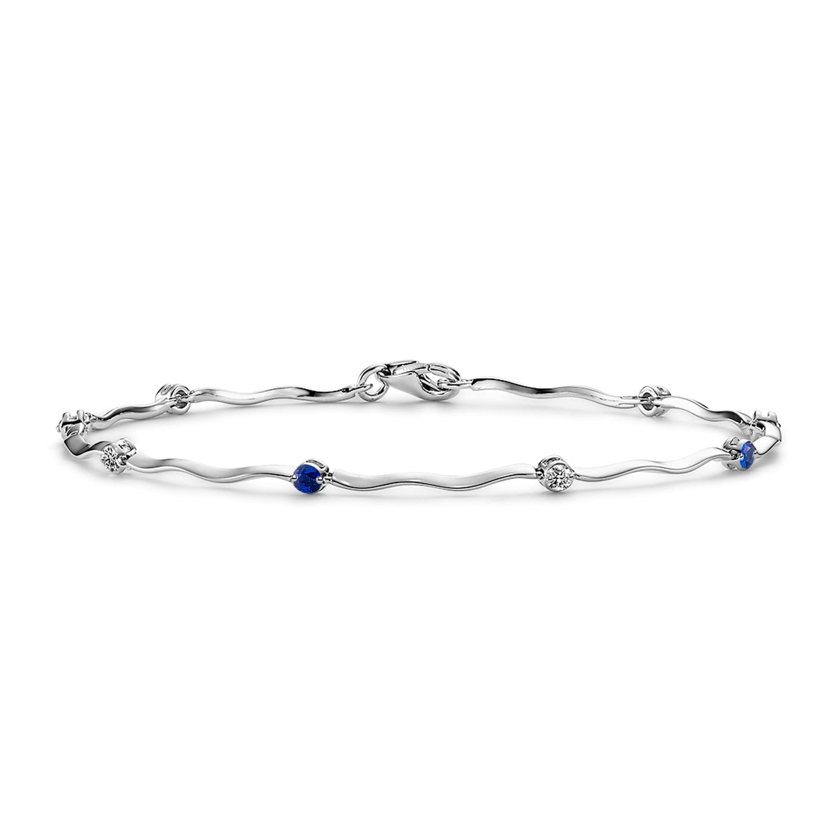 Blue Sapphire & Diamond Tennis Bracelet - Dracakis Jewellers